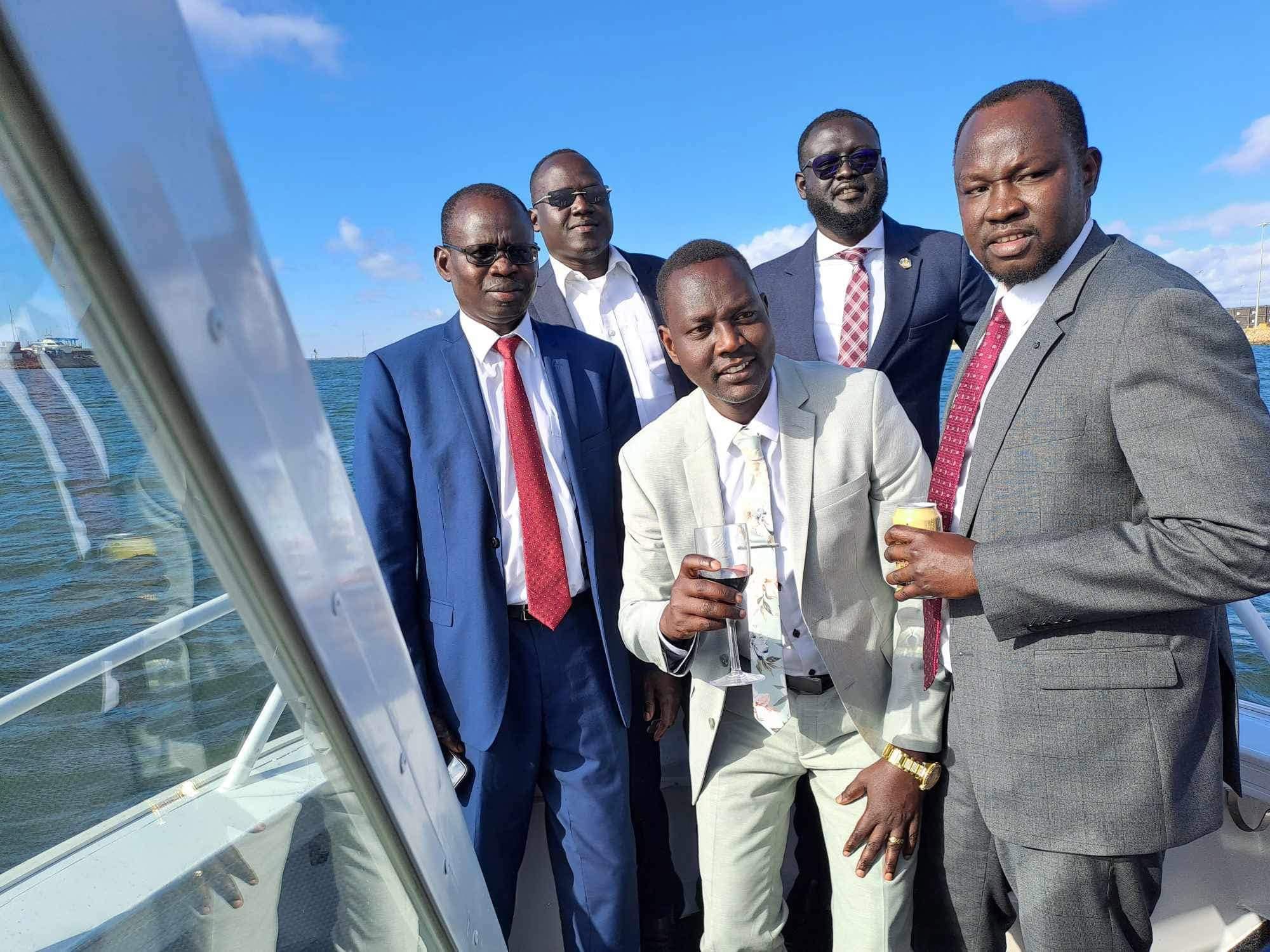 Guests toasting aboard a private Port River Cruises charter